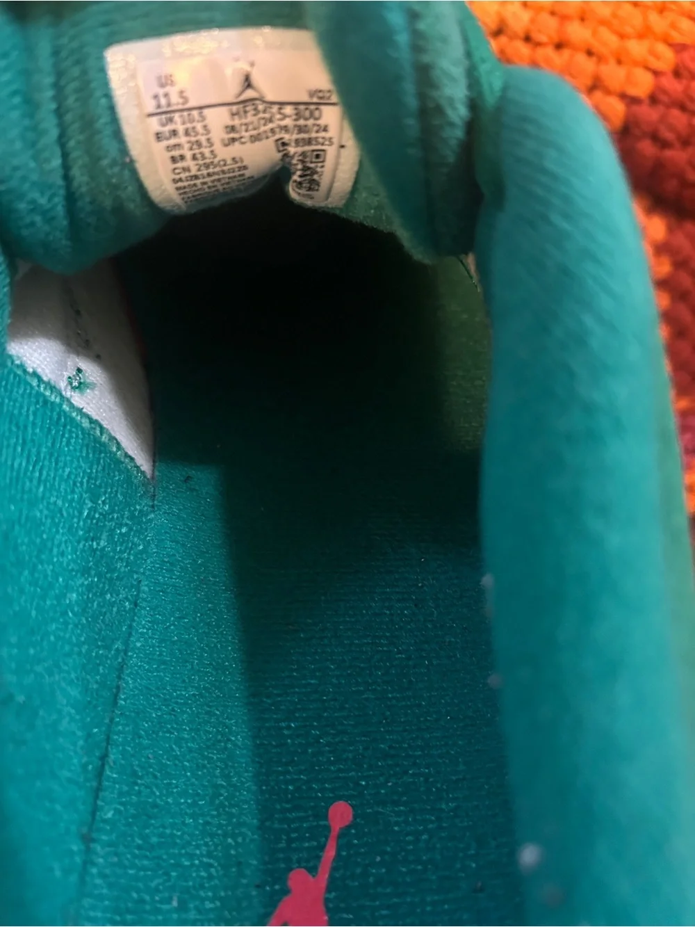 Jordan Men's Teal Green Sneakers with Pink Accent